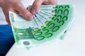 Man hands holding euro banknotes. Selective focus. Close-up Royalty Free Stock Photo