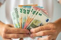 Man hands holding euro banknotes. Soft focus Royalty Free Stock Photo