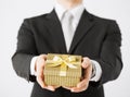 Man hands holding gift box Royalty Free Stock Photo