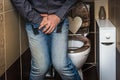 Man with hands holding his crotch - incontinence concept Royalty Free Stock Photo