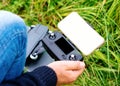 Man hands holding remote control for launching drone in day