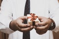 Man hands holding small gift box Royalty Free Stock Photo