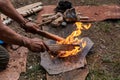 Man hands holding sticks in fire Royalty Free Stock Photo