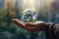 Man hands holding transparent earth globe over blurred background. Generative AI Royalty Free Stock Photo