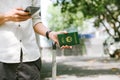 Man hands holding Vietnamese Passport. Ready for traveling. Royalty Free Stock Photo