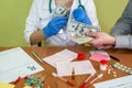 Man hands pay euro money to doctor