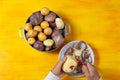 Man hands peeling potato for ajiaco Royalty Free Stock Photo