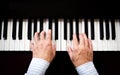 Man hands playing piano. Classical music. Art and abstract background. Royalty Free Stock Photo