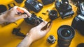Man Hands Repair Broken Film Camera, Photograph Workplace