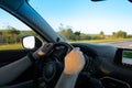 man hands on steering wheel car driving