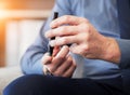 Man, hands and test blood sugar for diabetes, health analysis or medical glucometer results in office. Closeup of worker Royalty Free Stock Photo