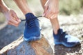 Man, hands and tie shoes for running, fitness or getting ready for workout, hiking or walk in nature. Hand of male Royalty Free Stock Photo