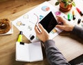 Man hands touching digital tablet. Wooden table with office supp Royalty Free Stock Photo