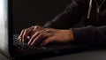 Man hands typing on laptop computer keyboard, hacker attack Royalty Free Stock Photo