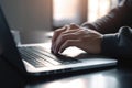 Man hands typing on laptop computer keyboard Royalty Free Stock Photo