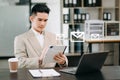 Man hands using Laptop, tablet typing and surfing the internet with email icon, email marketing concept, send e-mail or newsletter Royalty Free Stock Photo