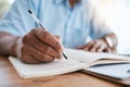 Man, hands and writing in book for finance, budget or schedule planning in remote work at home. Closeup hand of male Royalty Free Stock Photo