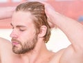 Man handsome bearded just wake up. Macho attractive appearance care about beauty. Essential practices beauty routine Royalty Free Stock Photo