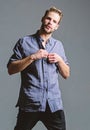 Man handsome sexy hipster undressing. Guy sexy muscular body take off shirt. Full desire. Seductive macho feeling sexy Royalty Free Stock Photo