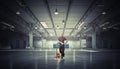 Man with handtruck in warehouse