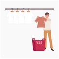 man hanging wet clothes out to dry. drying clothes after washing. Flat vector cartoon illustration Royalty Free Stock Photo