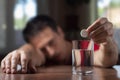 Man With Hangover Taking Medicine Pill Cure Royalty Free Stock Photo