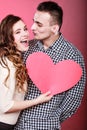 Man and happy blinking woman. Love concept. Royalty Free Stock Photo