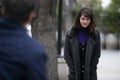 Man Harassing Woman on the Street or a Criminal Stalking Victim Royalty Free Stock Photo