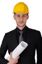 Man with Hard Hat Holding Rolled Up Blueprints Royalty Free Stock Photo