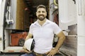 man with a hard hat standing in front of truck Royalty Free Stock Photo