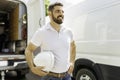 man with a hard hat standing in front of truck Royalty Free Stock Photo