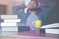 man has break resting after reading