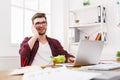 Man has healthy business lunch in modern office interior Royalty Free Stock Photo