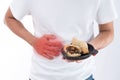 A man has a stomachache after eating delicious zongzirice dumpling on Dragon Boat Festival, Asian traditional food Royalty Free Stock Photo