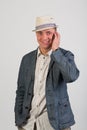 A man in a hat with a phone Royalty Free Stock Photo