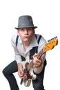 Man with hat plays electric guitar