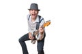 Man with hat plays electric guitar