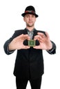 The man in the hat showing a microchip computer