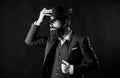 Man with hat. Vintage fashion. Man well groomed bearded gentleman on dark background. Male fashion and menswear. Retro Royalty Free Stock Photo