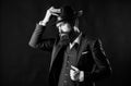 Man with hat. Man well groomed bearded gentleman on dark background. Male fashion and menswear. Retro fashion hat Royalty Free Stock Photo