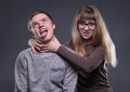 Man-hater blond woman and man Royalty Free Stock Photo