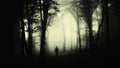 Man in creepy forest with fog on Halloween Royalty Free Stock Photo