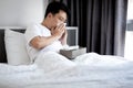 man have a stuffy nose,runny nose,blow or wipe one's nose with tissue paper,asian male have a fever and cold or flu, Royalty Free Stock Photo