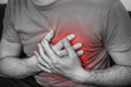 Man having chest pain, heart attack - black and white Royalty Free Stock Photo