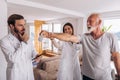 Man having chiropractic arm adjustment. Royalty Free Stock Photo