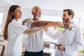 Man having chiropractic arm adjustment. Royalty Free Stock Photo