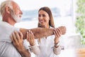 Man having chiropractic arm adjustment. Royalty Free Stock Photo