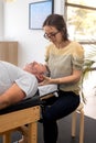 Senior man having chiropractic adjustment. Royalty Free Stock Photo