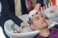 Man having hair wash salon