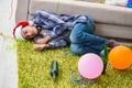 The man having hangover after christmas party Royalty Free Stock Photo